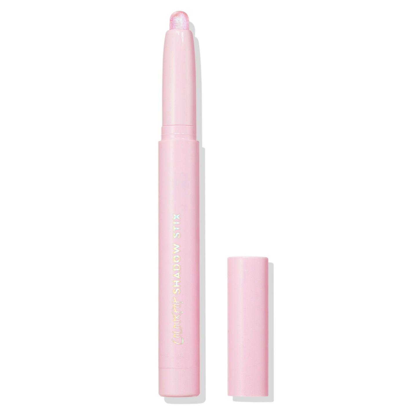 Colourpop Disco Disco Shadow Stix eye crayon standing upright with cap off, revealing a shimmering light pink cream eyeshadow tip, shown on a white background for a clean, minimal product shot.