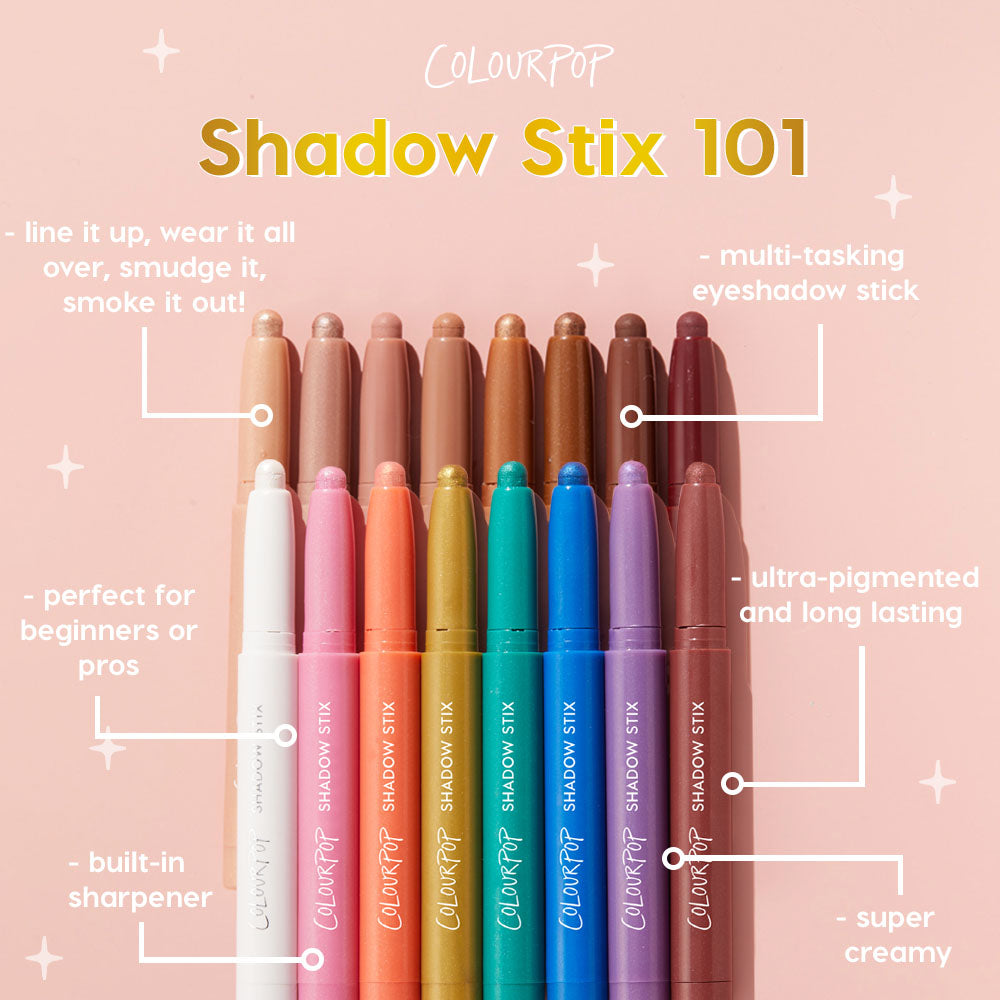 Colourpop Plum Tart Shadow Stix eyeshadow crayon standing with a row of colorful Shadow Stix on a soft pink background, highlighting its creamy, ultra‑pigmented, long‑lasting stick formula for easy all‑over eyeshadow application.