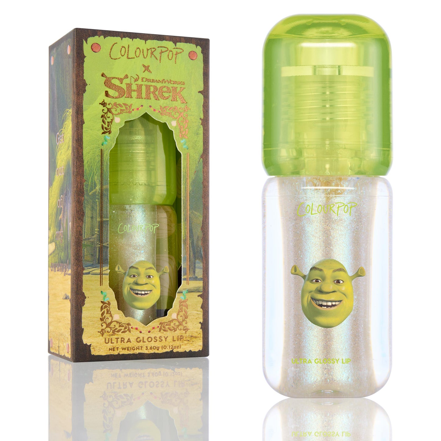 ColourPop Ultra Glossy Lip in Ogre stands upright with a lime-green cap and Shrek graphic on a pearly, iridescent clear gloss bottle, shown beside its Shrek-themed box on a clean white background.